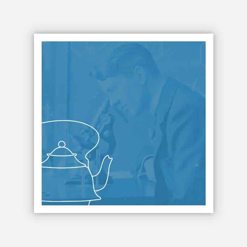 Blue-toned archival portrait of a metalworker at a bench with a teapot outline